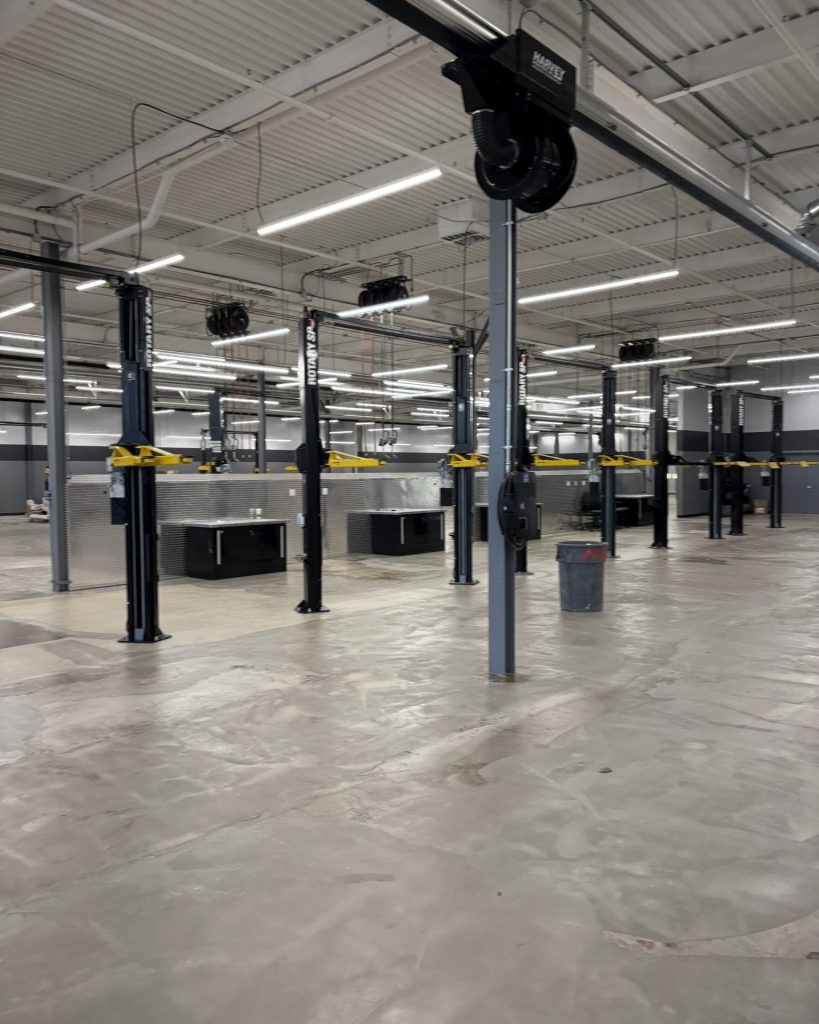 2-POST ABOVE ground lifts, exhaust extraction system, and oil reels